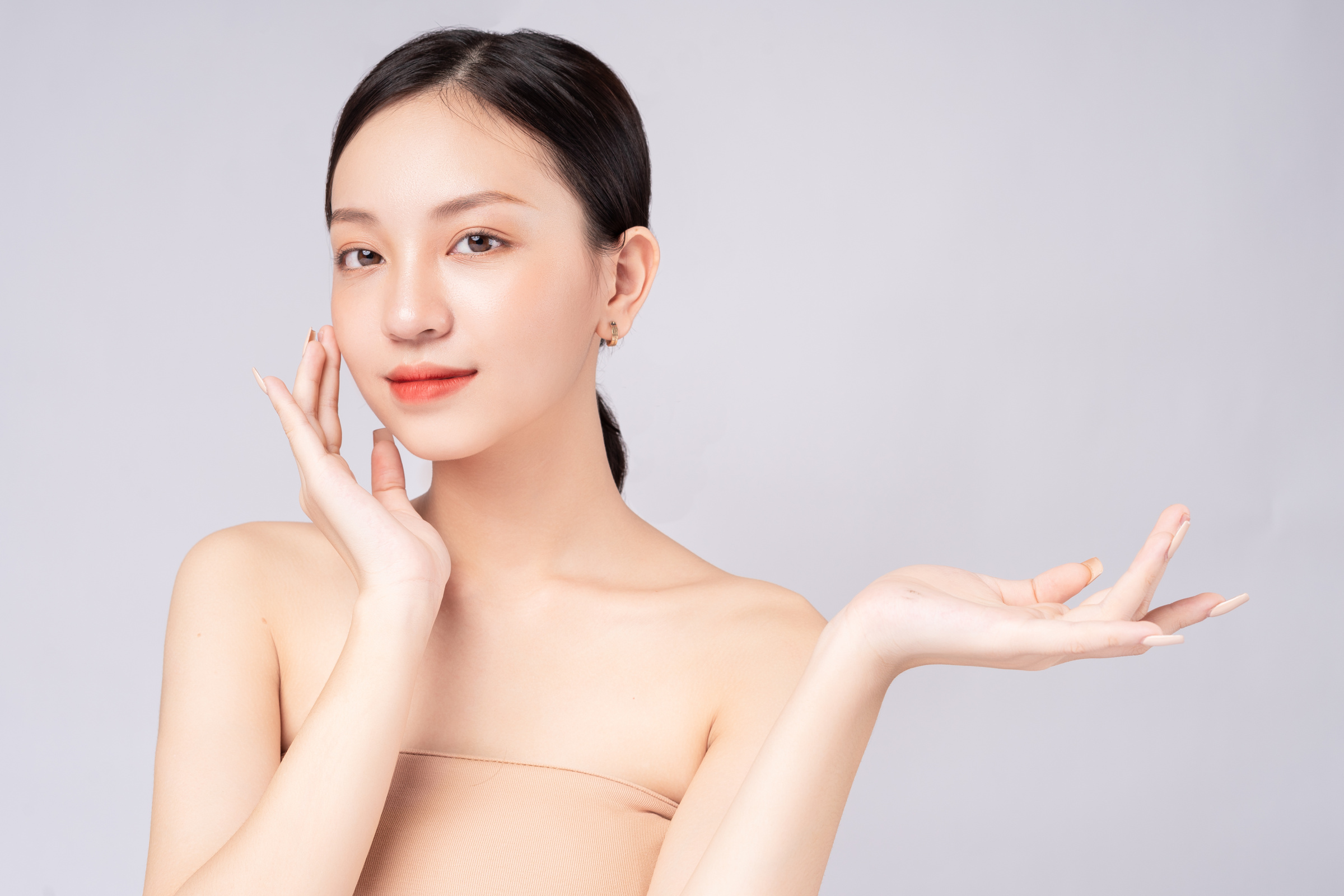 Beautiful Asian Woman Feels Happy with Beautiful Healthy Skin